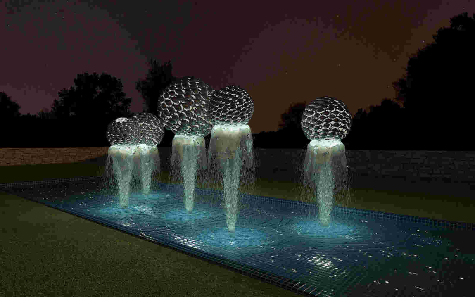 Fishball fountain made of cast bronze fish spheres, with water running through it