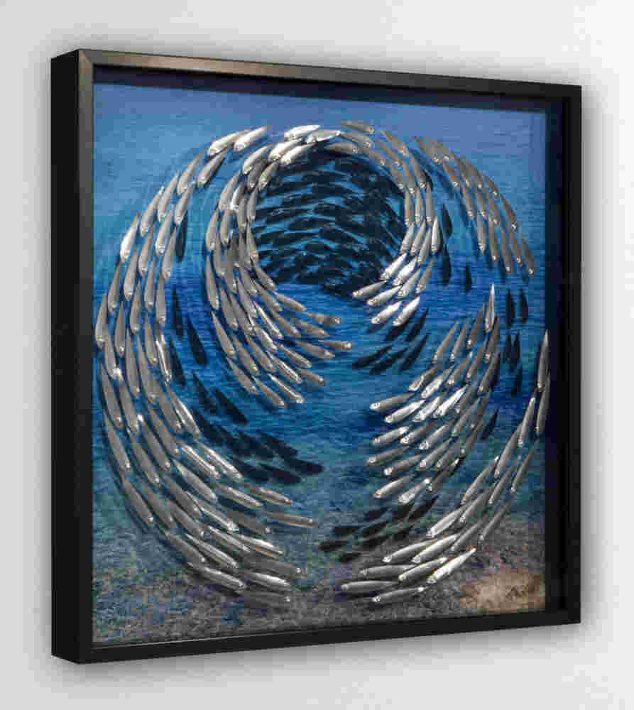 Three-dimensional wall sculpture, school of fish theme, with layers of plexiglass, aluminum frame and spherical aluminum fish.