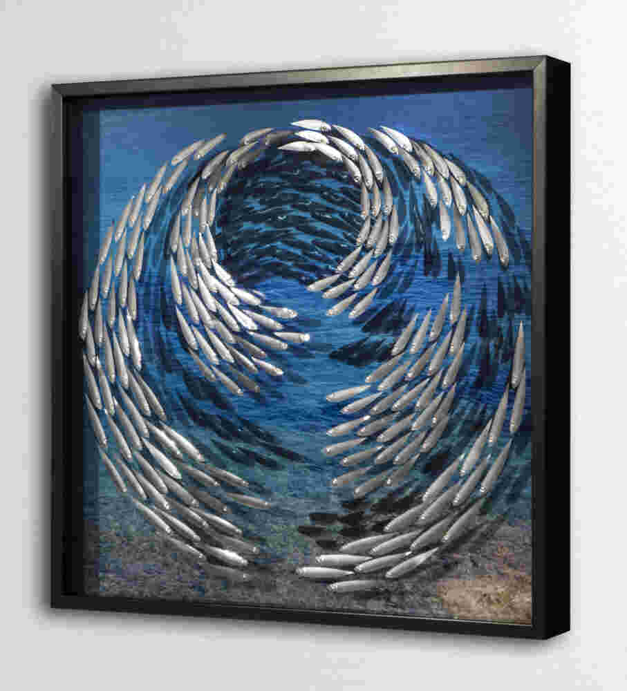 Three-dimensional wall sculpture, school of fish theme, with layers of plexiglass, aluminum frame and spherical aluminum fish.