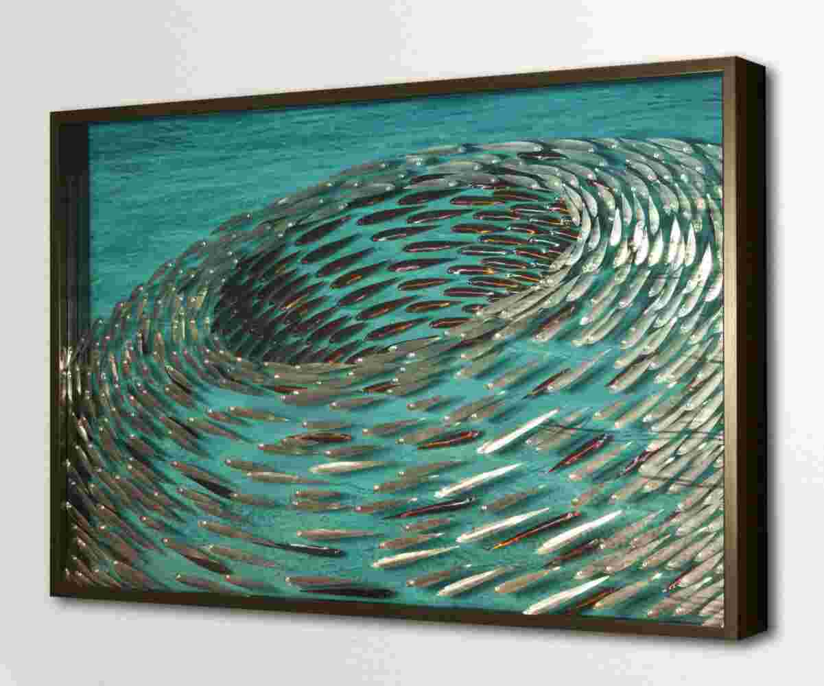 Three-dimensional wall sculpture, school of fish theme, with layers of plexiglass, aluminum frame and swirling metal fish.