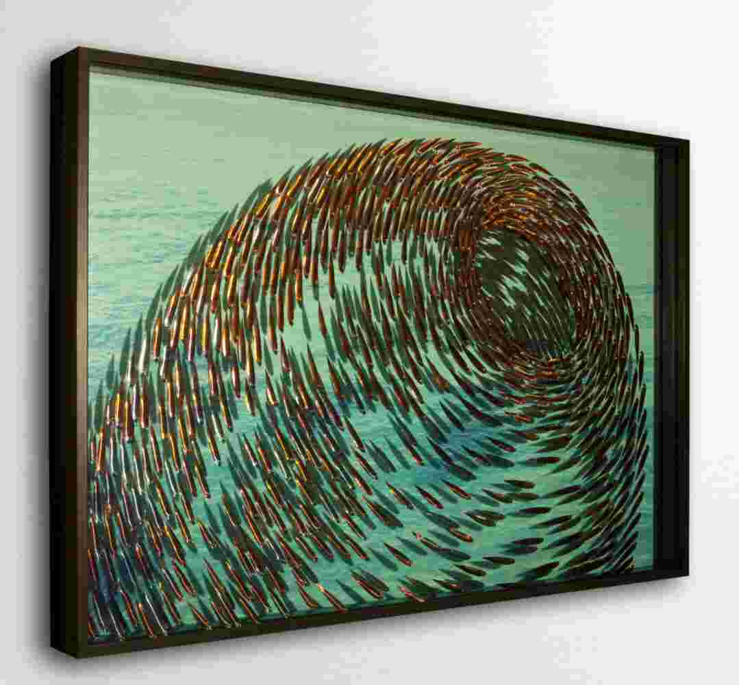 Three-dimensional wall sculpture, school of fish theme, with layers of plexiglass, aluminum frame and swirling copper fish.