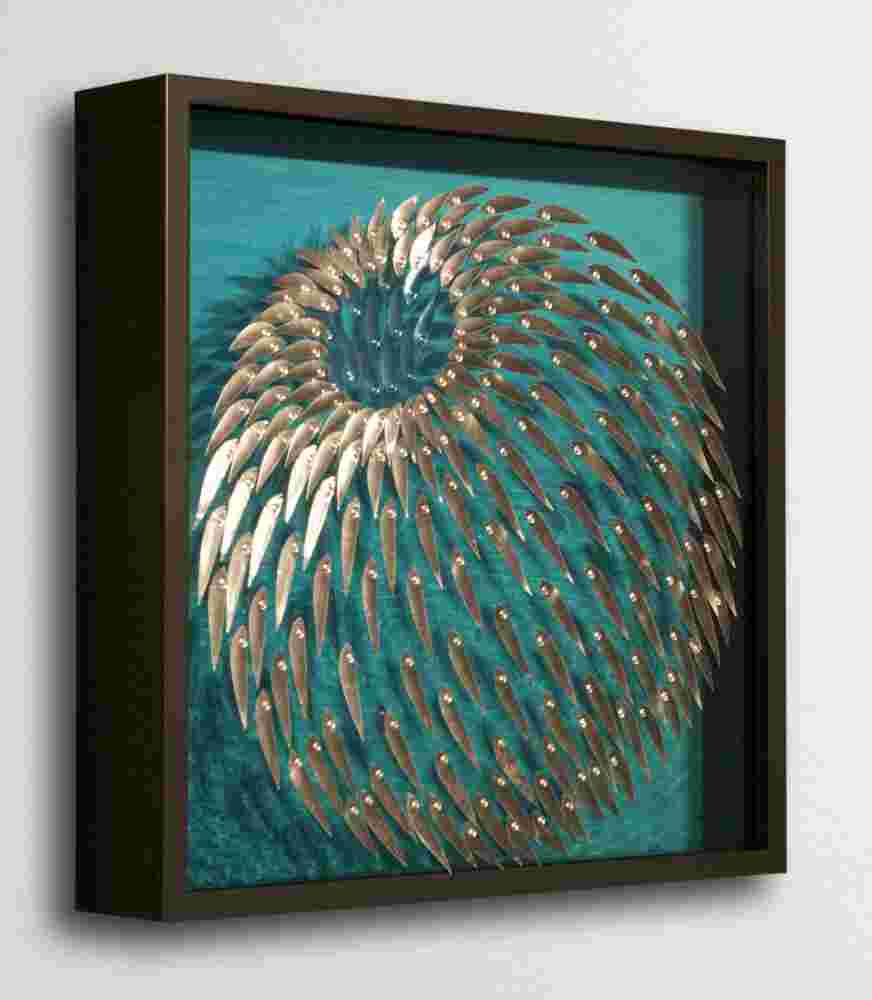 Three-dimensional wall sculpture, school of fish theme, with layers of plexiglass, aluminum frame and spherical aluminum fish.