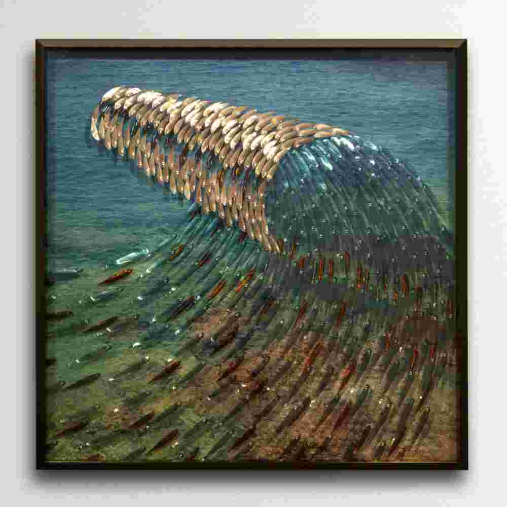 Three-dimensional wall sculpture, school of fish theme, with layers of plexiglass, aluminum frame and wave of aluminum and copper fish.