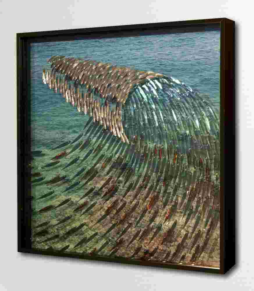 Three-dimensional wall sculpture, school of fish theme, with layers of plexiglass, aluminum frame and wave of aluminum and copper fish.