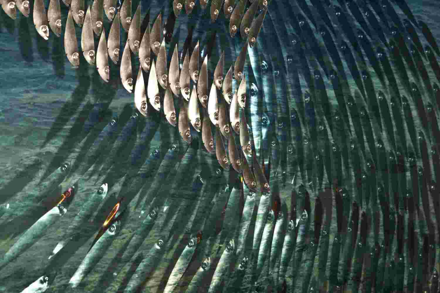 Three-dimensional wall sculpture, school of fish theme, with layers of plexiglass, aluminum frame and wave of aluminum and copper fish.