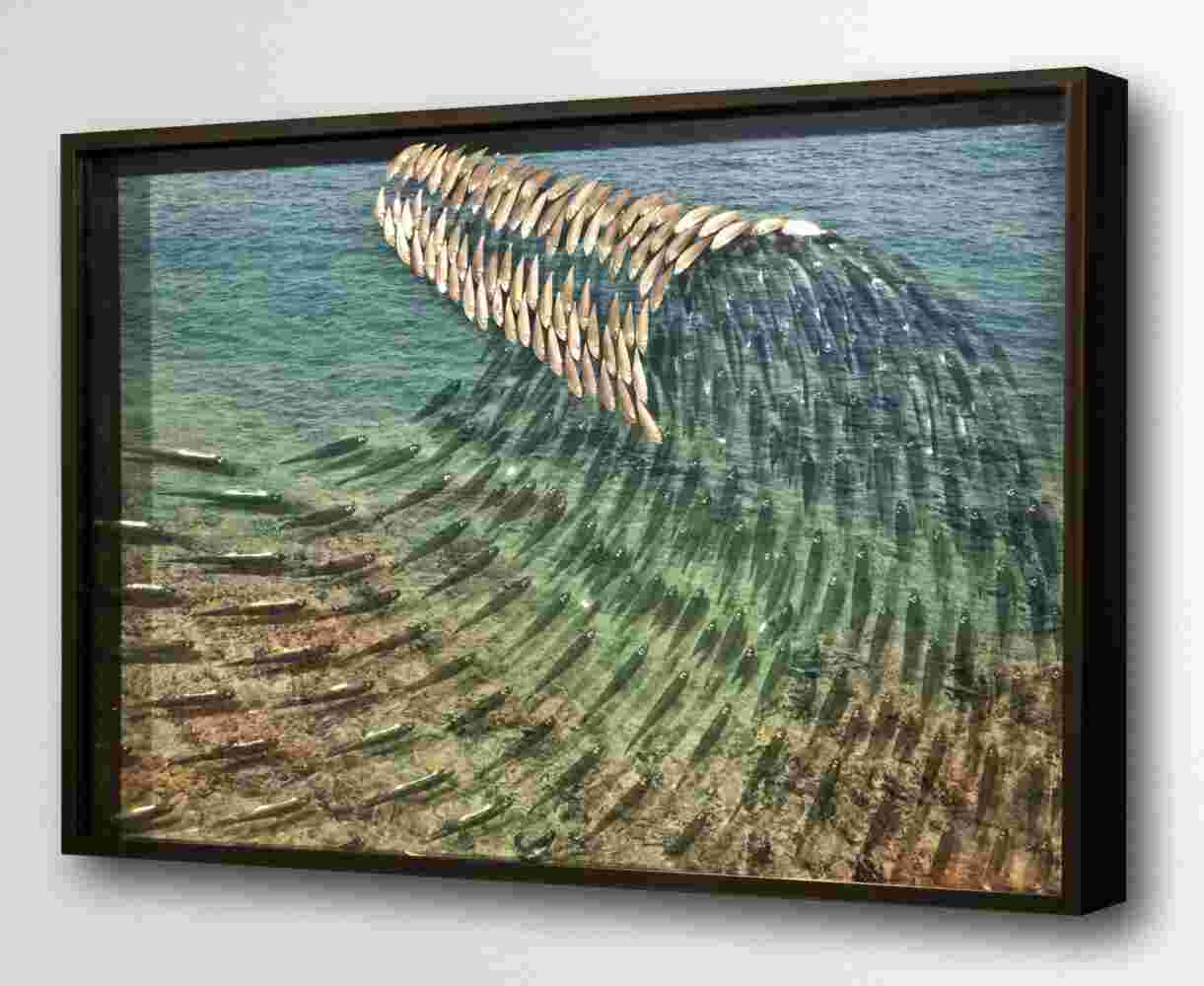 Three-dimensional wall sculpture, school of fish theme, with layers of plexiglass, aluminum frame and a wave of aluminum and copper fish.