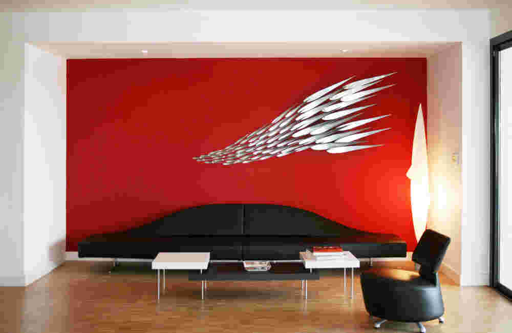 Emigration (Bordeaux, France) Flowing stainless steel fish wall art