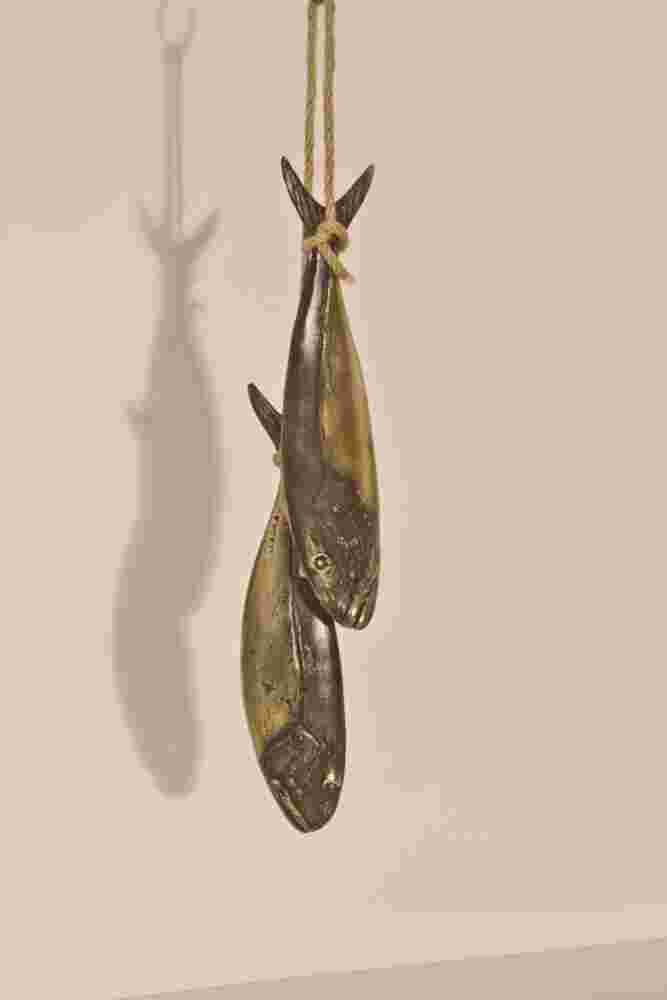 Hanging pair of bronze fish sculptures