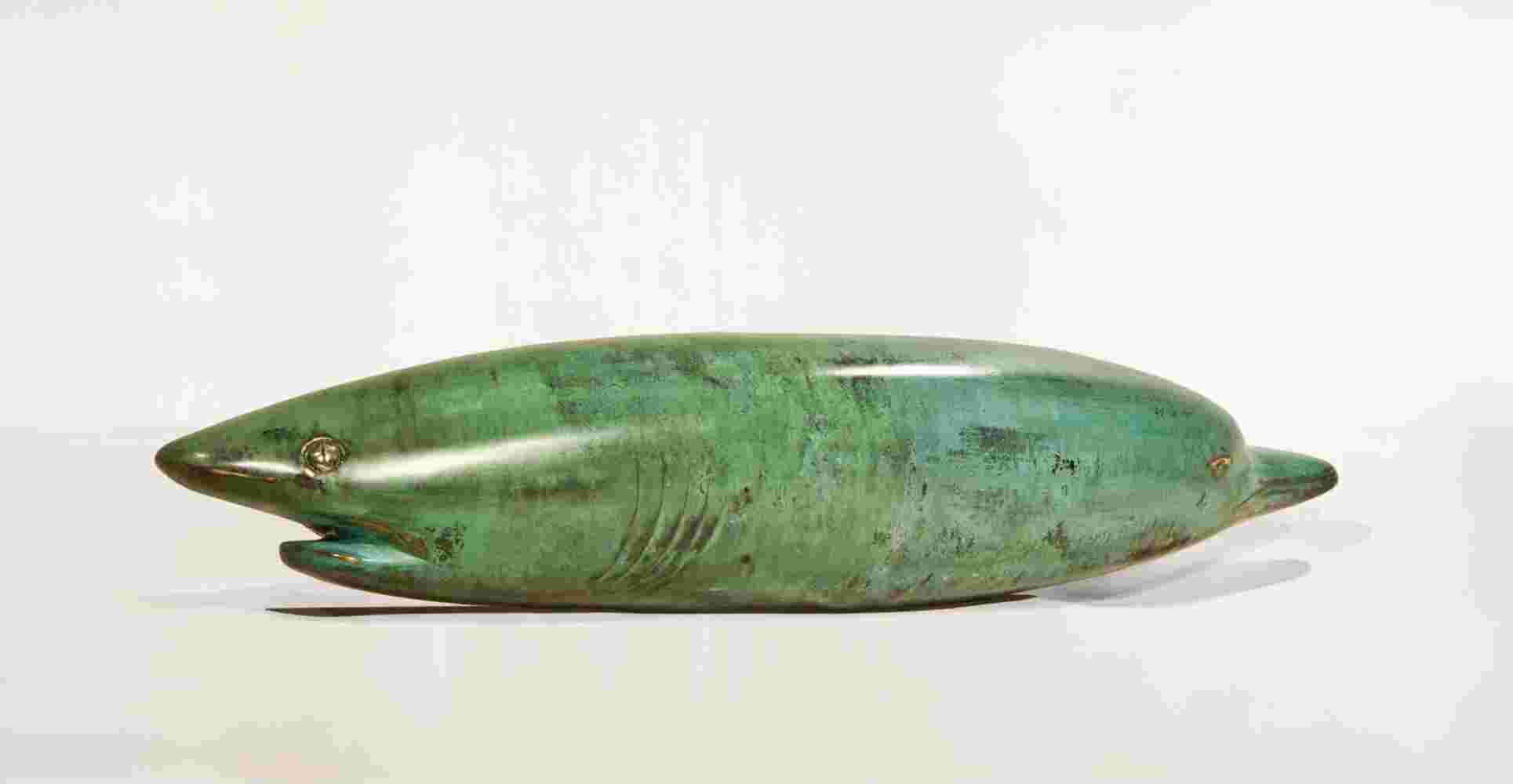 Surrealistic bronze green patina sculpture, half dolphin, half shark