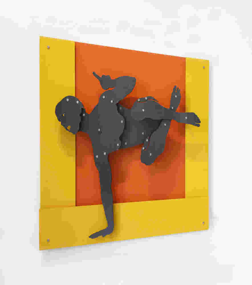 Athletic person wall sculpture. Made with yellow and orange steel.