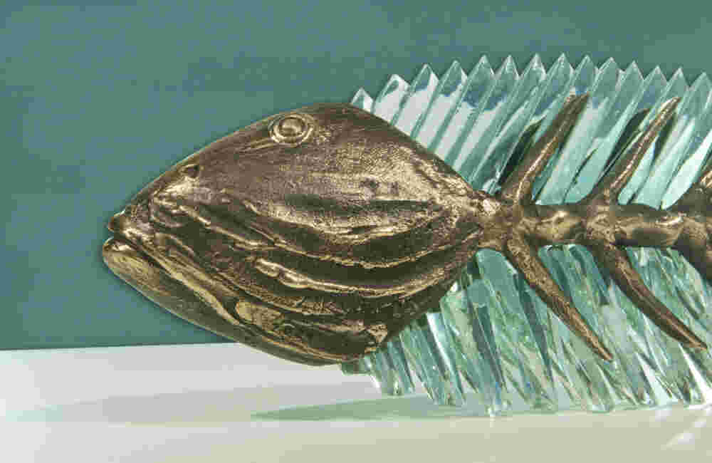 Cast bronze & glass sculpture of a fish. “Frozen Fish”.