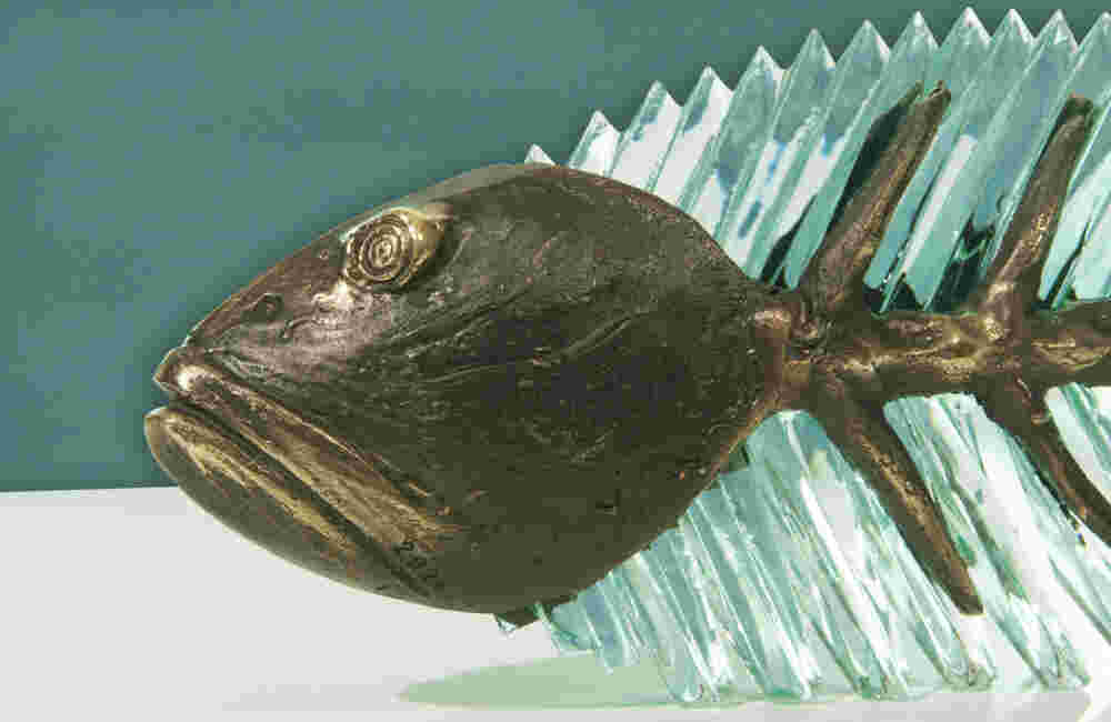 Cast bronze & glass sculpture of a fish. “Frozen Fish”.