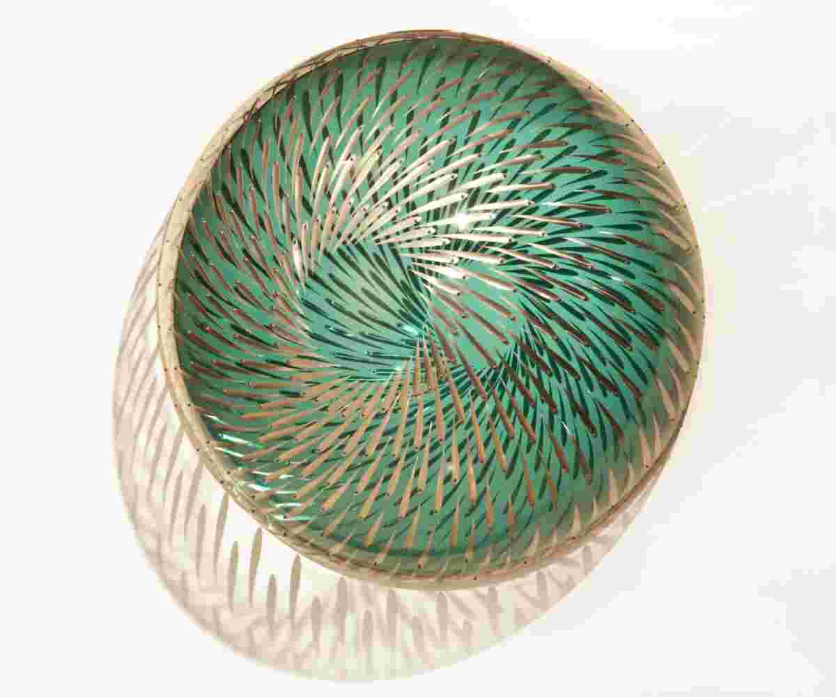 Three-dimensional wall sculpture, school of fish theme, with layers of plexiglass, aluminum frame and a wave of aluminum fish.