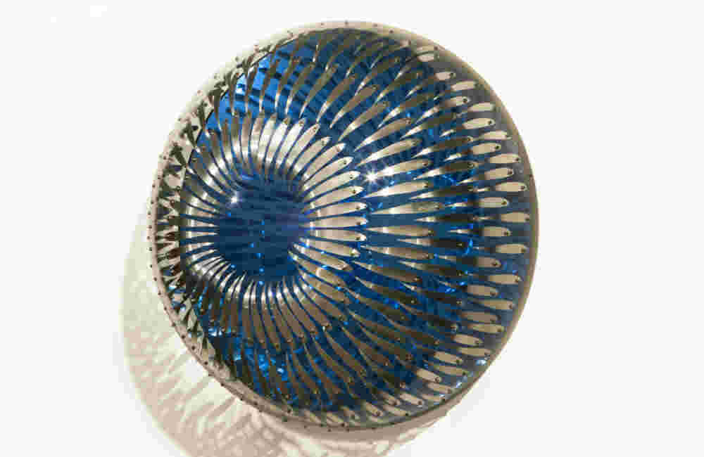 Swirling acrylic hemisphere with aluminum fish