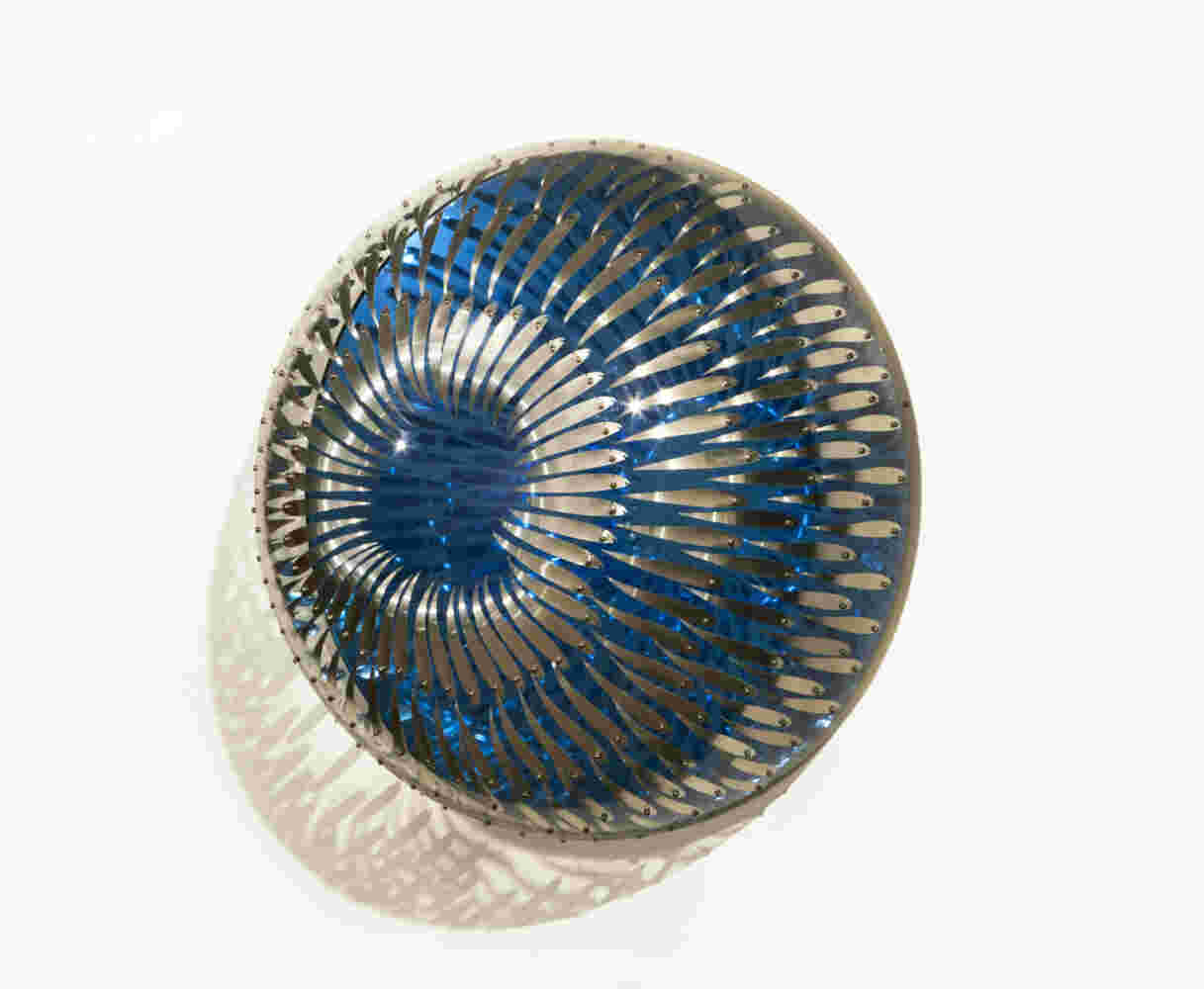 Swirling acrylic hemisphere with aluminum fish
