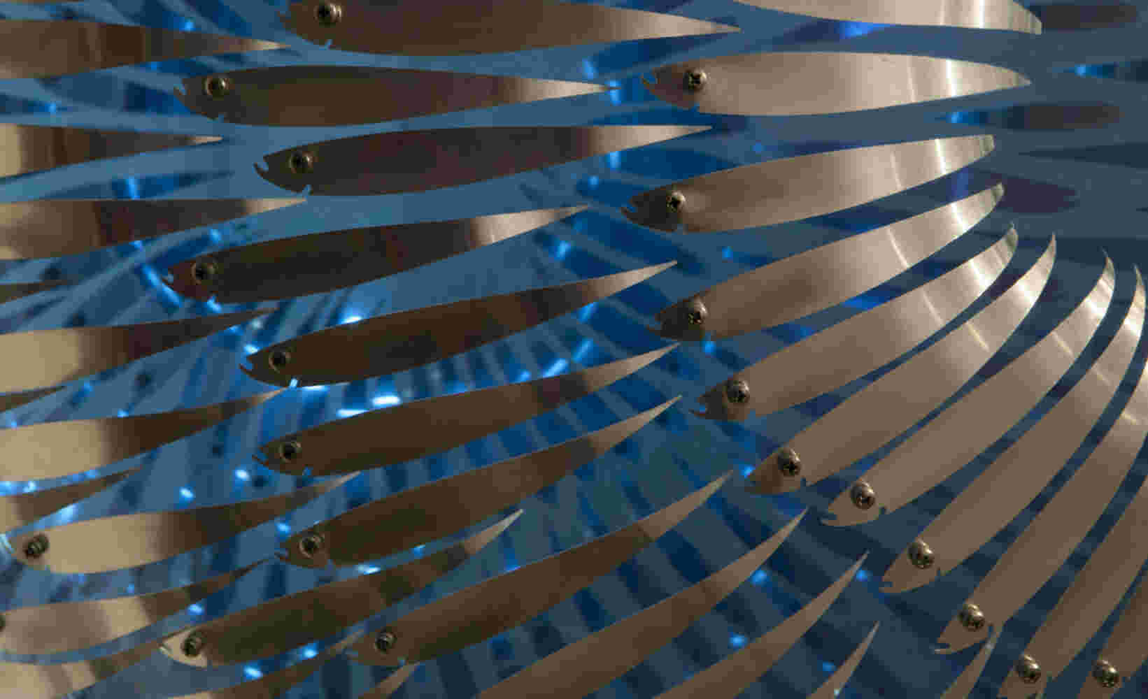 Swirling acrylic hemisphere with aluminum fish