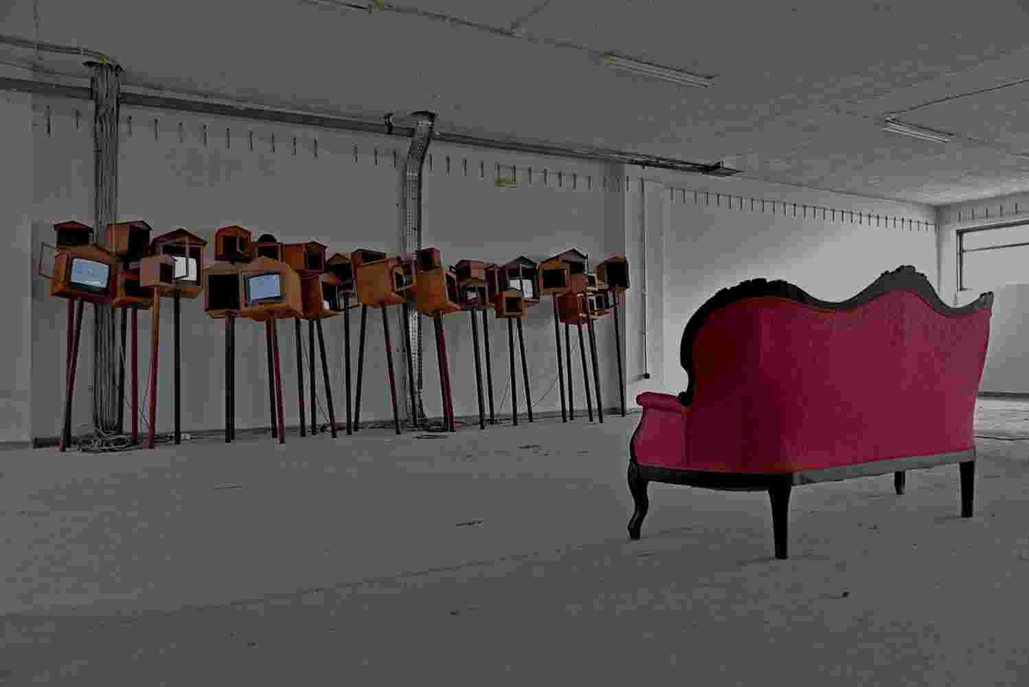 Large art installation of 29 shrines made of rusted steel