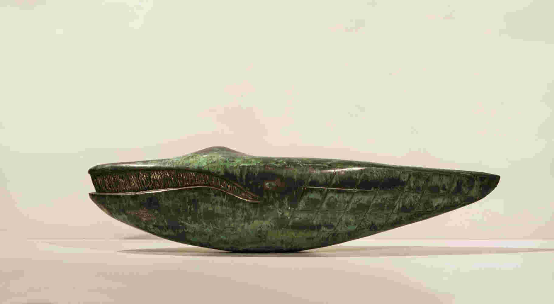 Surrealistic bronze green patina sculpture, half whale, half submarine