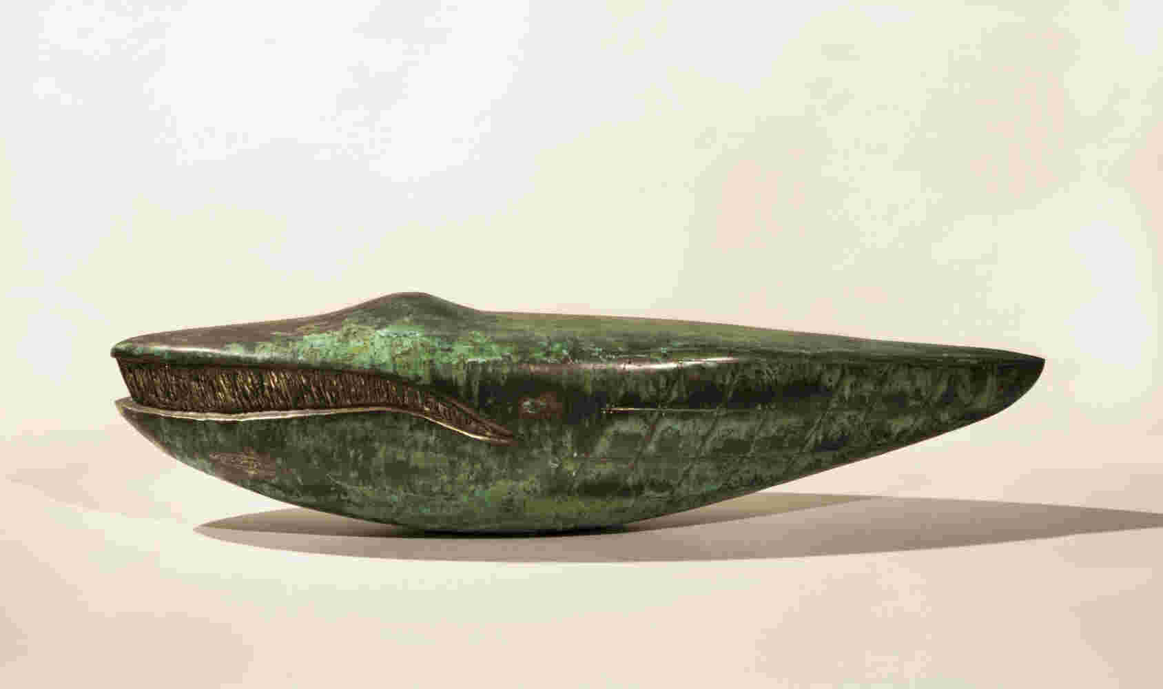 Surrealistic bronze green patina sculpture, half whale, half submarine