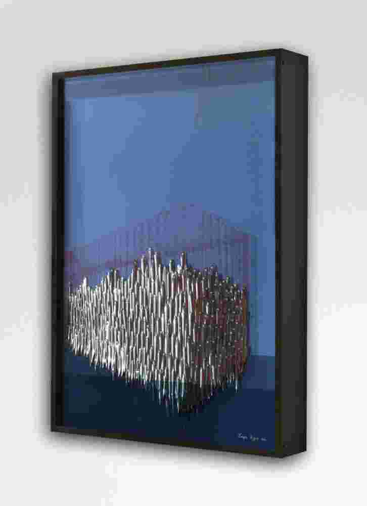 Mixed media wall sculpture of fish being captured in a cage