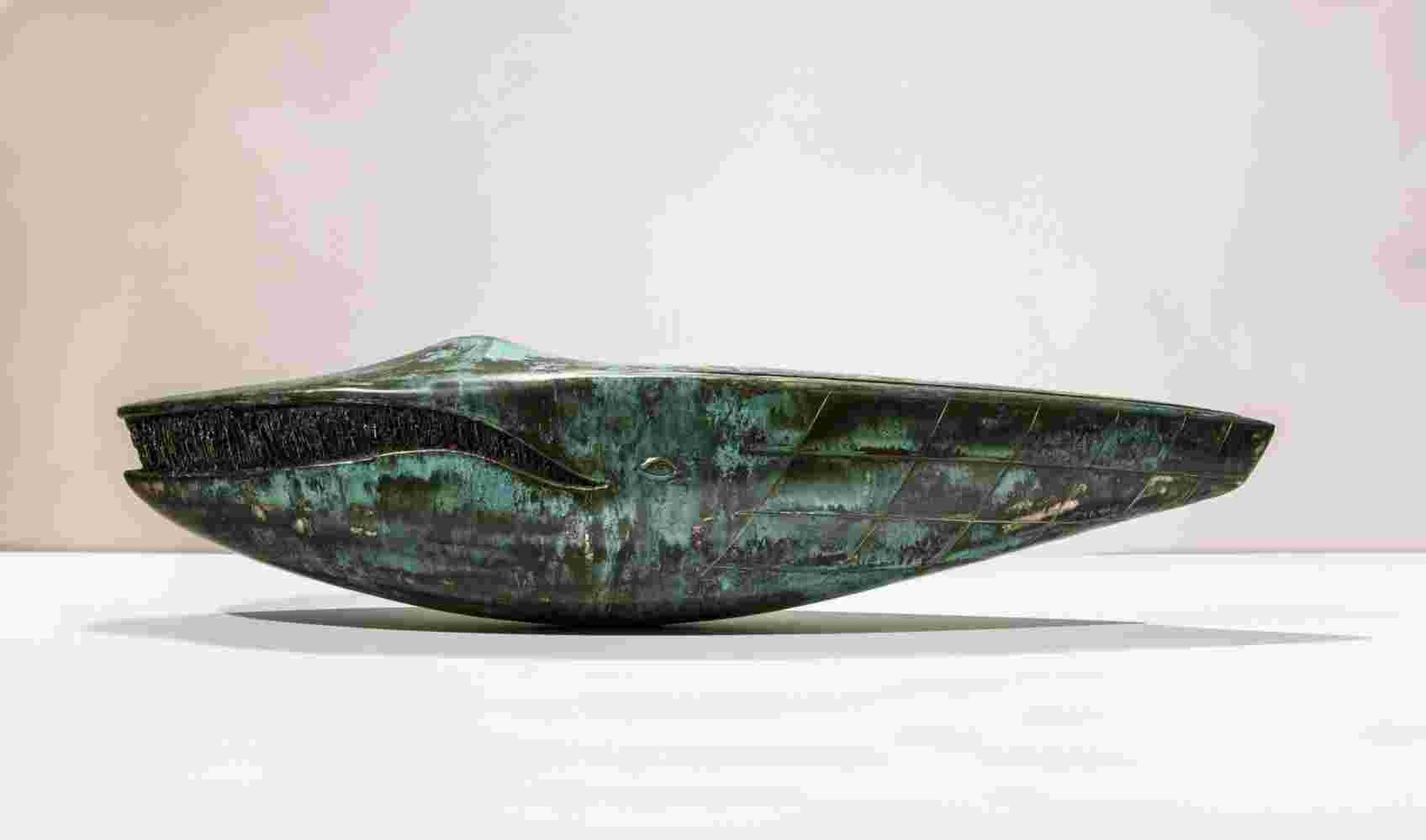 Surrealistic bronze green patina sculpture, half whale, half submarine