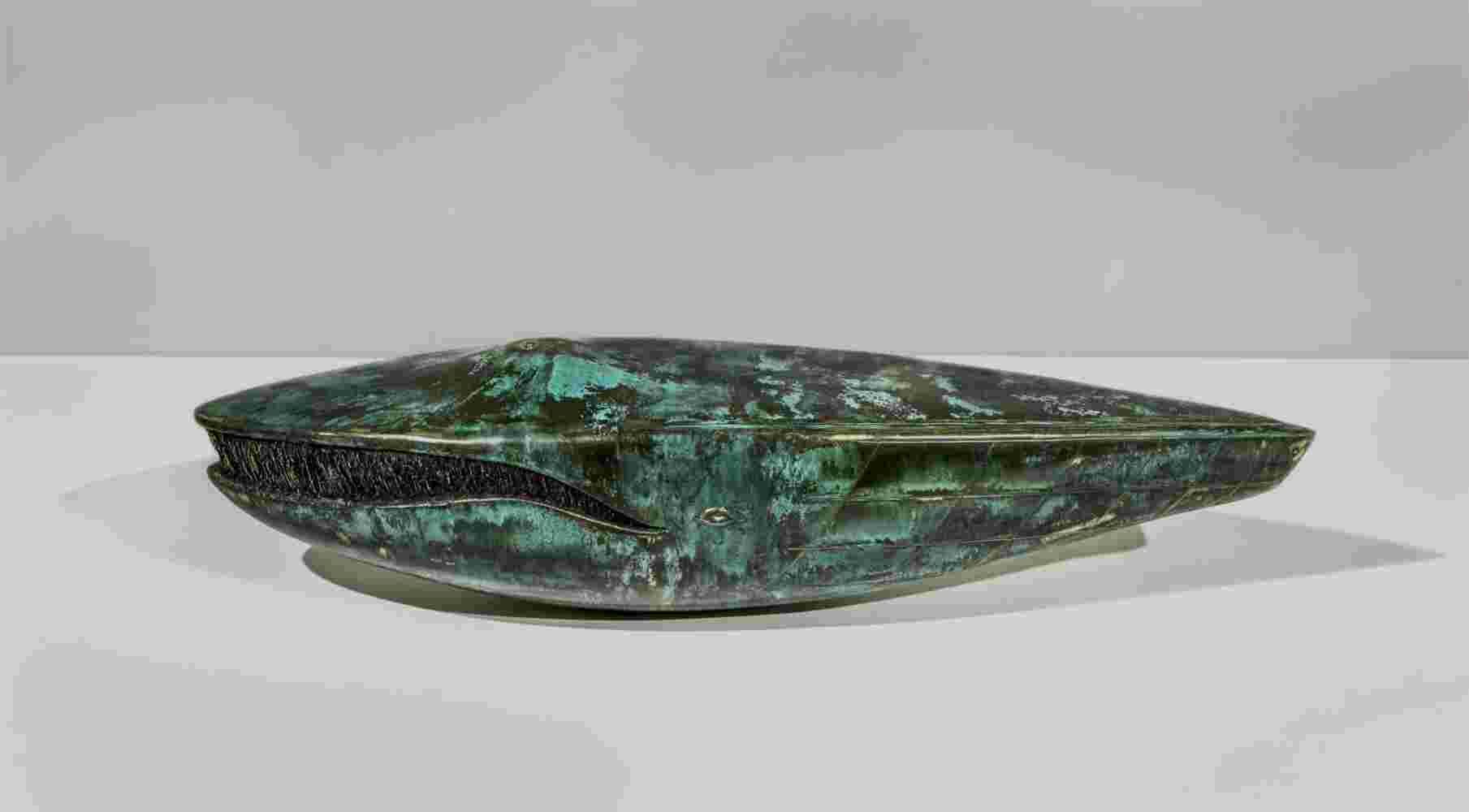 Surrealistic bronze green patina sculpture, half whale, half submarine