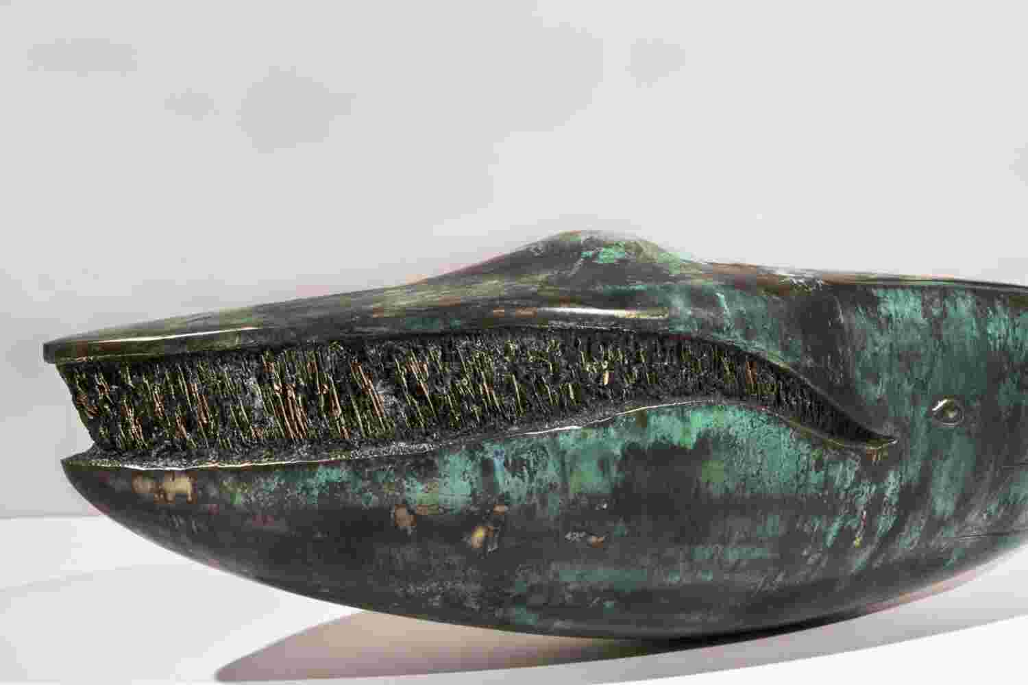 Surrealistic bronze green patina sculpture, half whale, half submarine