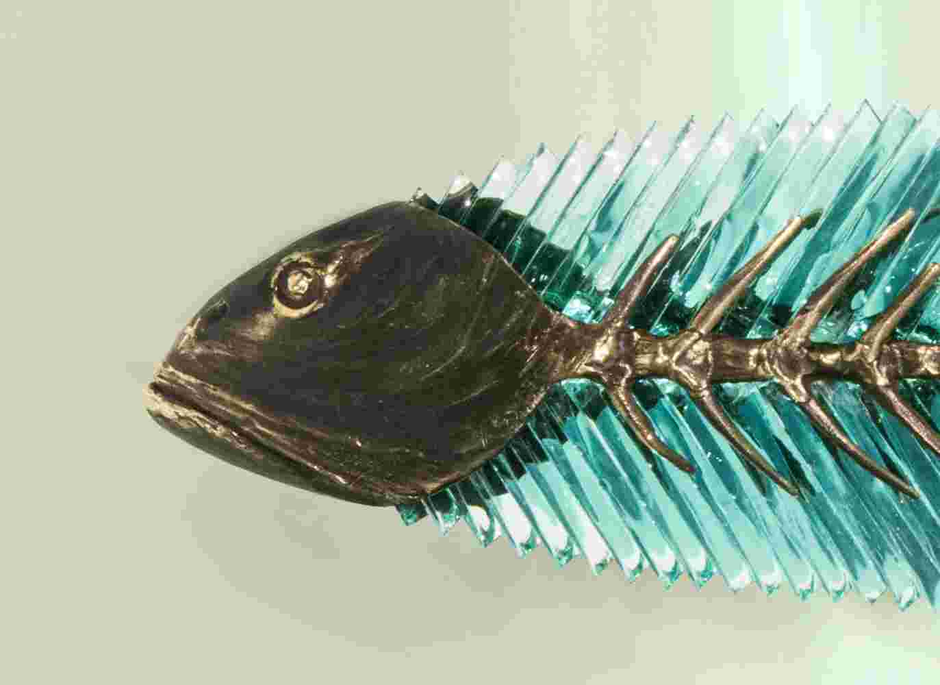 Cast bronze & glass sculpture of a fish. “Frozen Fish” collection