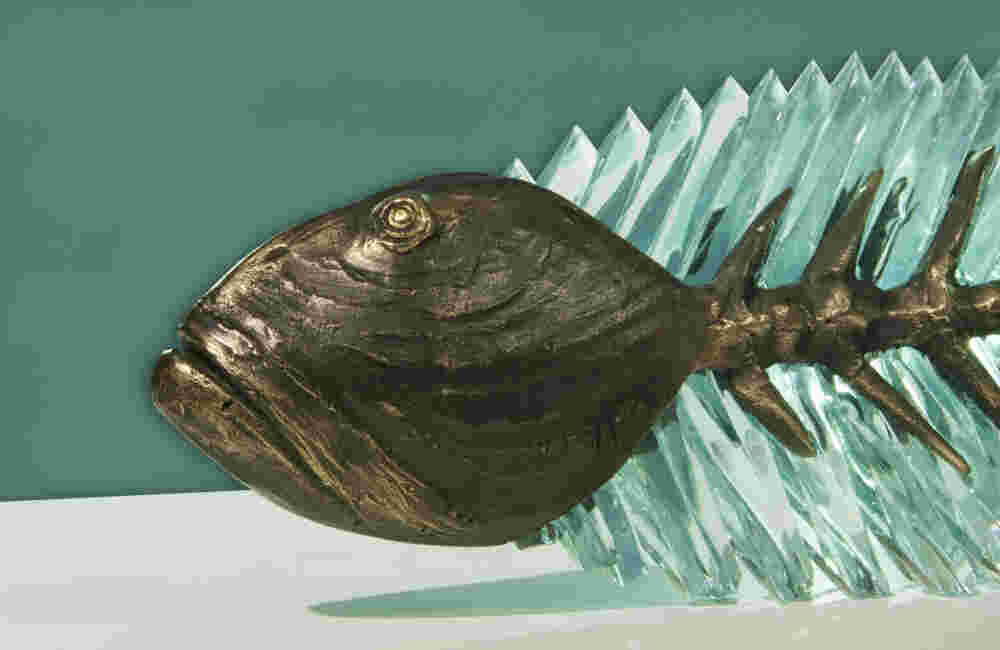 Cast bronze & glass sculpture of a fish. “Frozen Fish”.