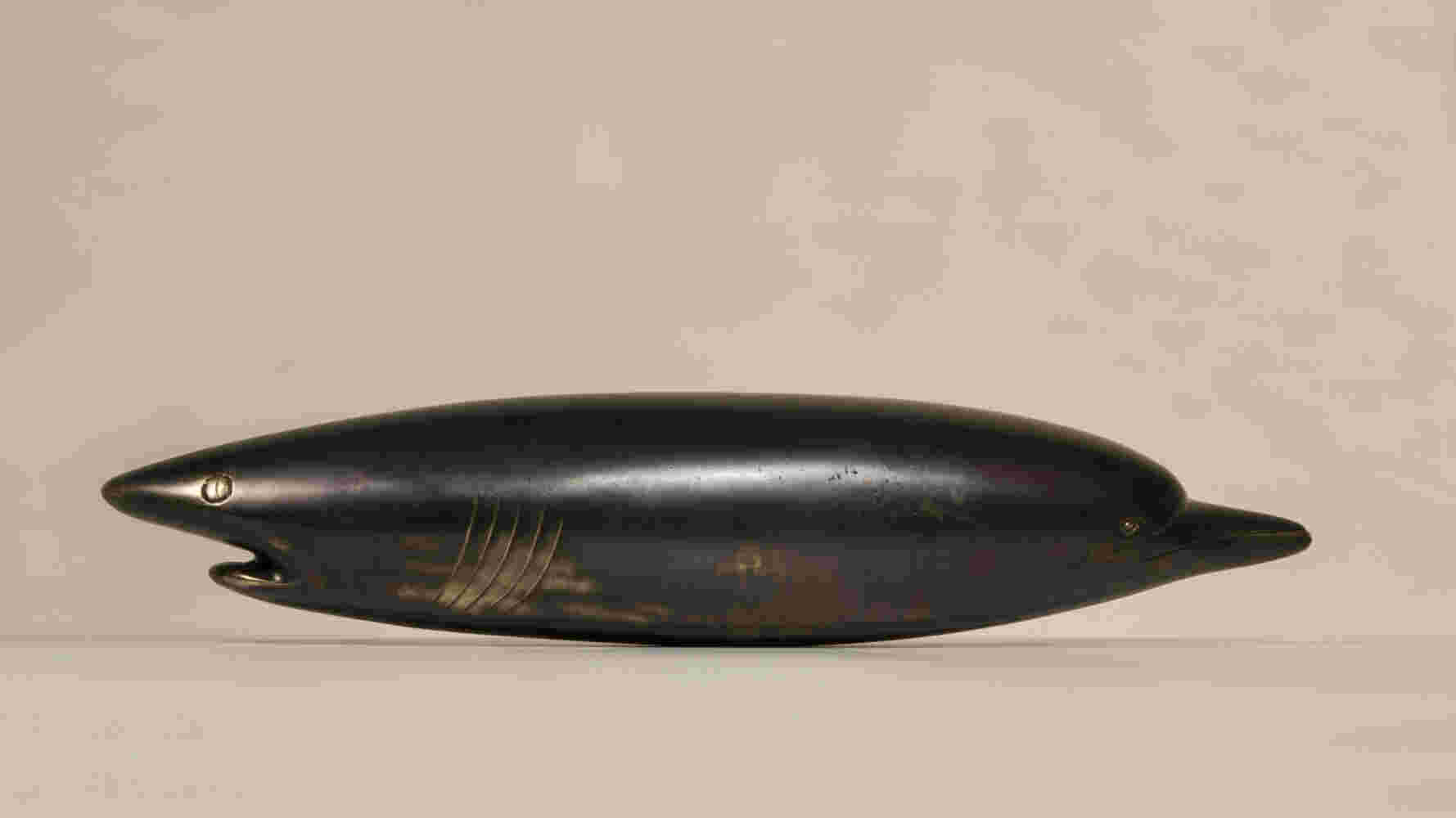 Surrealistic bronze black patina sculpture, half dolphin, half shark