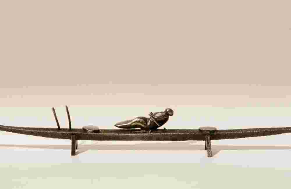Small Ceremonial Boat 72 Small boat sculpture made of cast bronze.