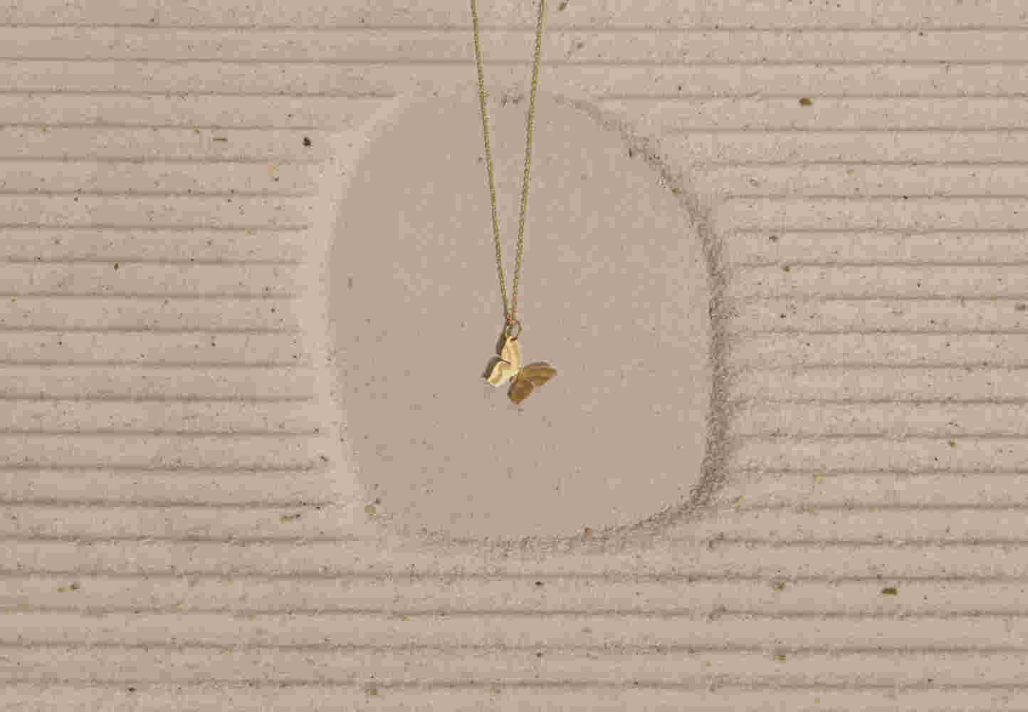 Gold butterfly necklace
