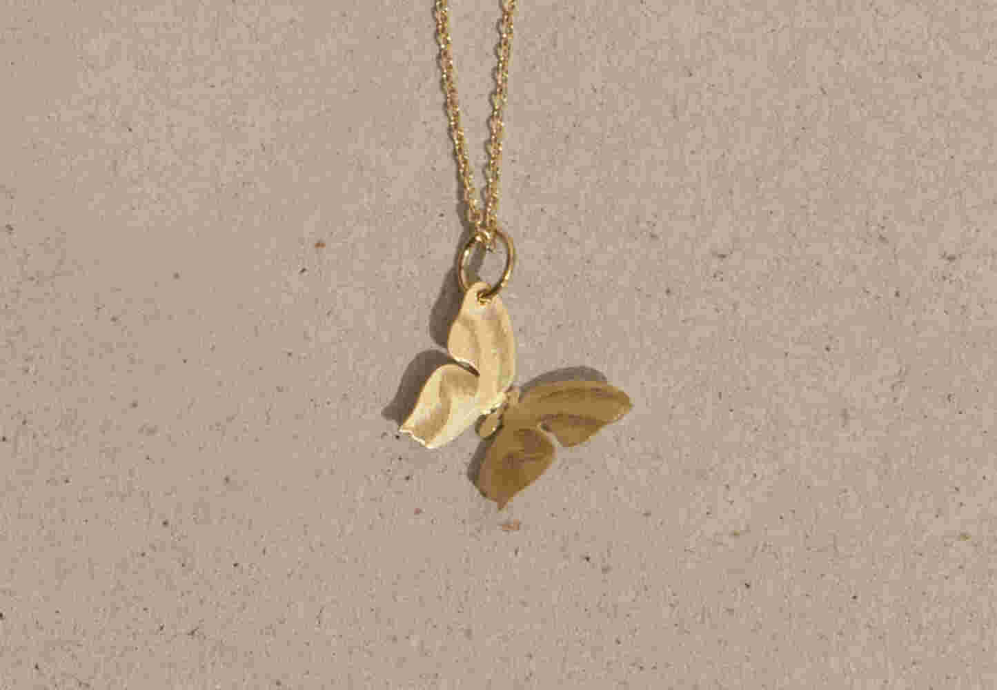 Gold butterfly necklace