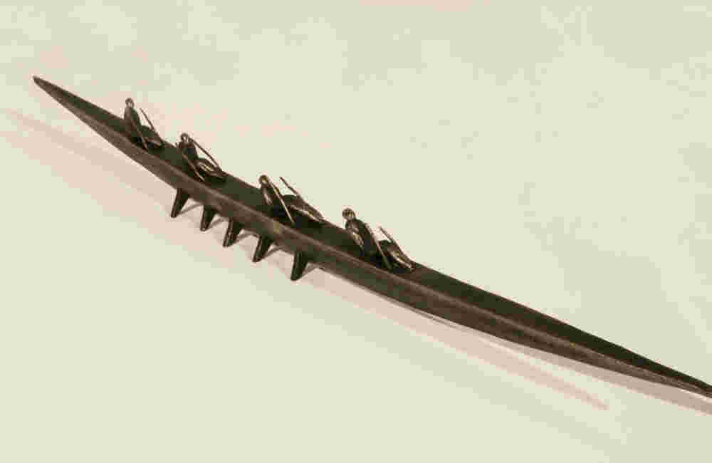 Small Ceremonial Boat 80 Small boat sculpture made of cast bronze.