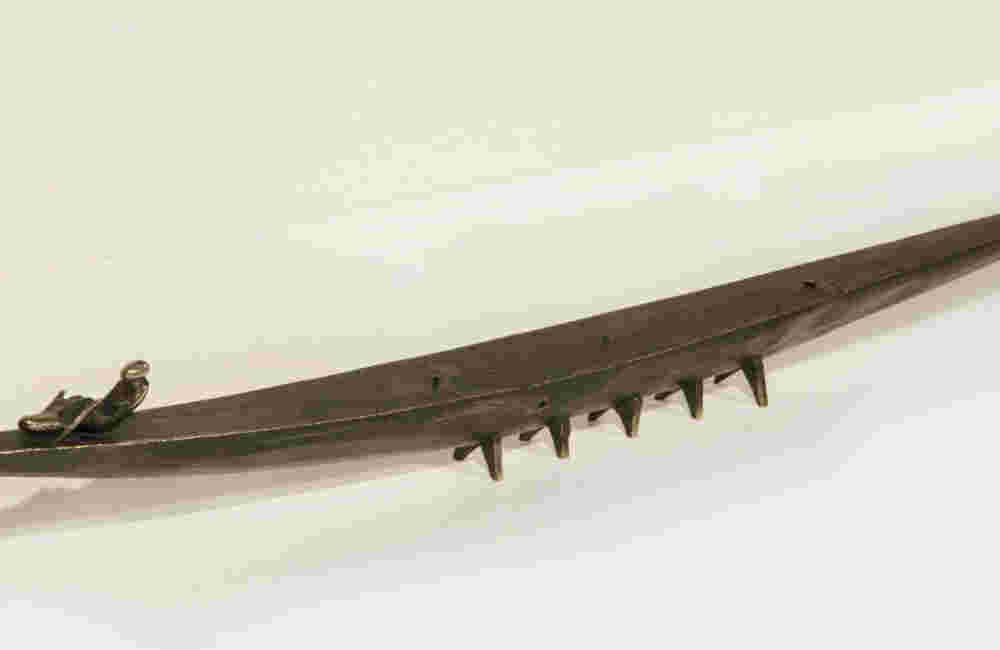 Small Ceremonial Boat 83 Small boat sculpture made of cast bronze.