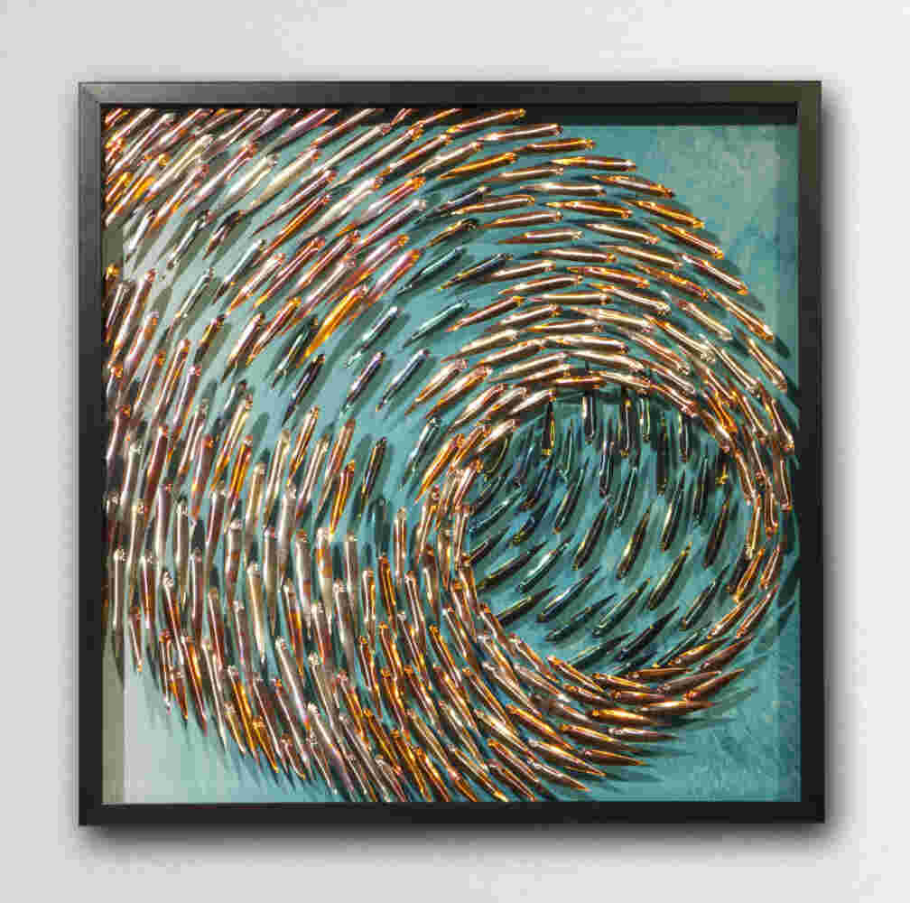 Three-dimensional wall sculpture, school of fish theme, with layers of plexiglass, aluminum frame and swirling copper fish.
