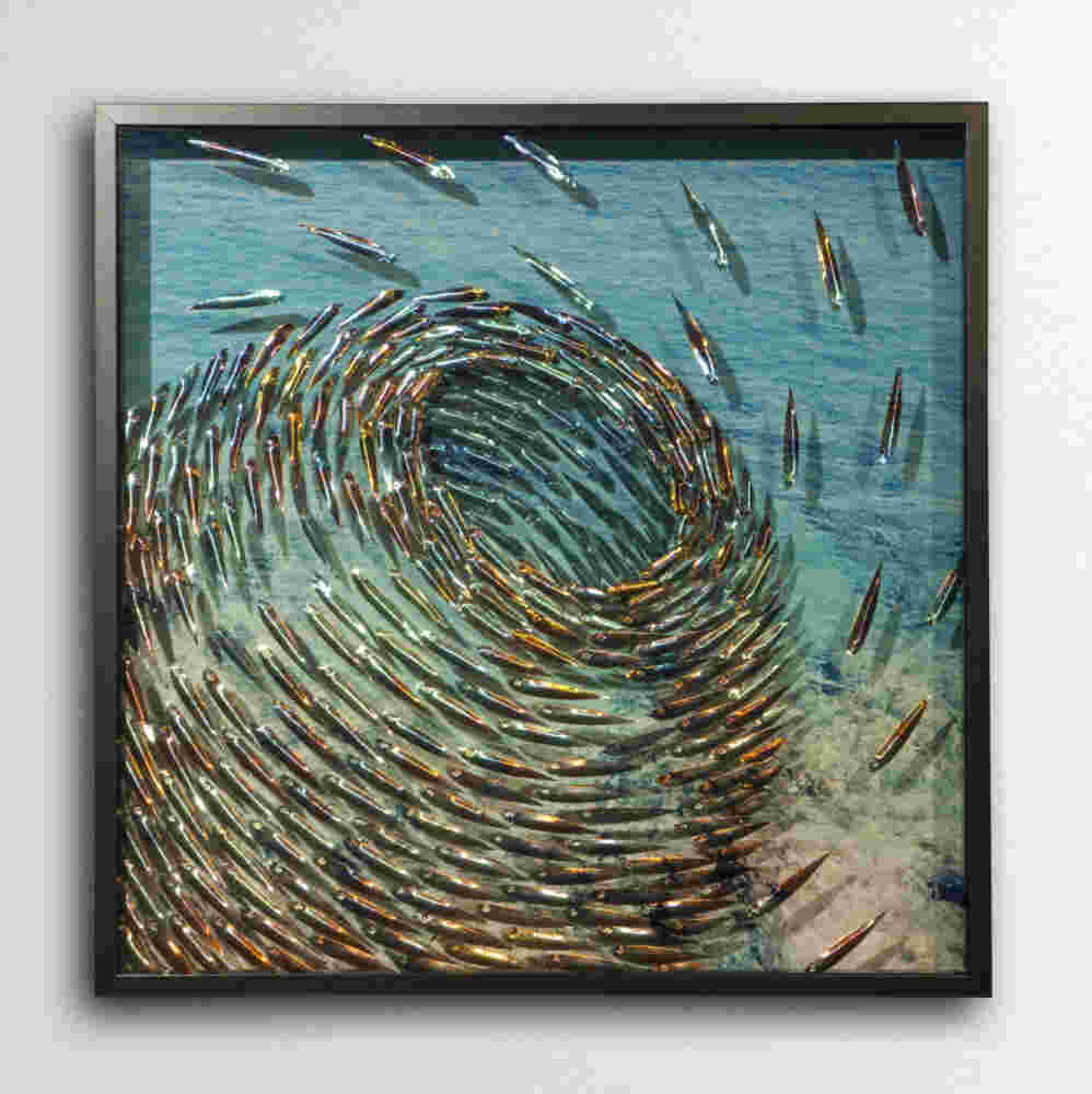 Three-dimensional wall sculpture, school of fish theme, with layers of plexiglass, aluminum frame and swirling copper fish.
