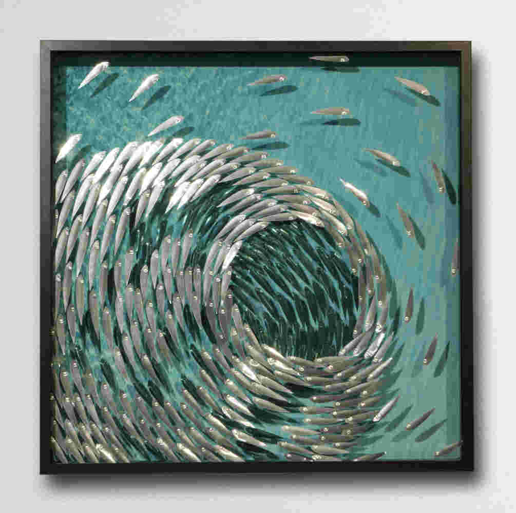 Three-dimensional wall sculpture, school of fish theme, with layers of plexiglass, aluminum frame and swirling copper fish.