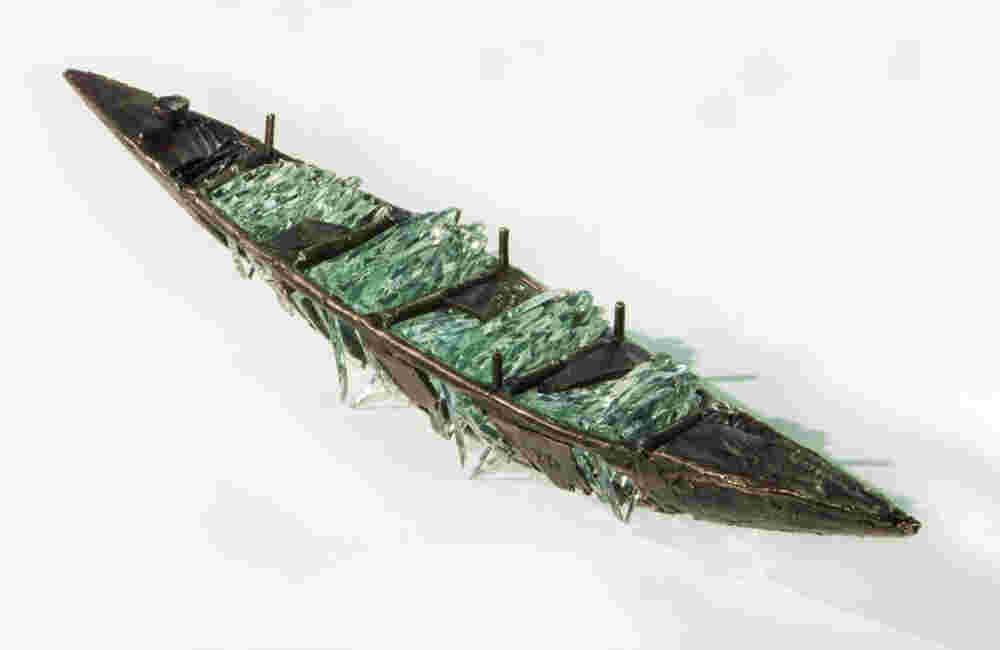 SW 088 Shipwreck boat sculpture made of hand cut glass and bronze.