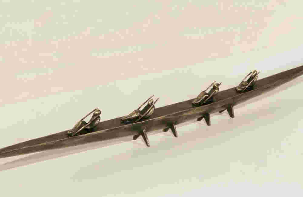 Small Ceremonial Boat 84 Small boat sculpture made of cast bronze.