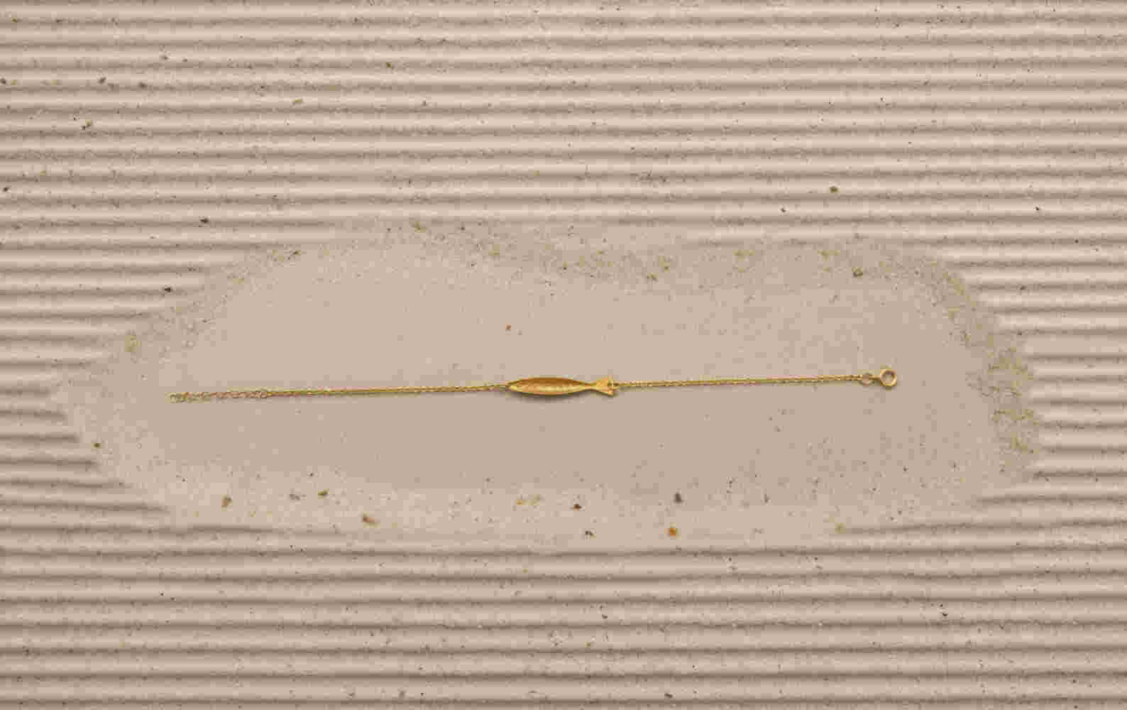 Gold etched fish bracelet with chain