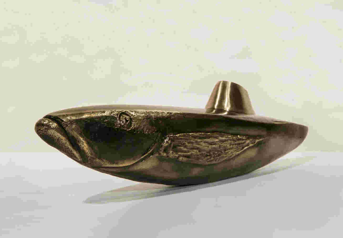 Surrealistic bronze green patina sculpture, half fish, half submarine