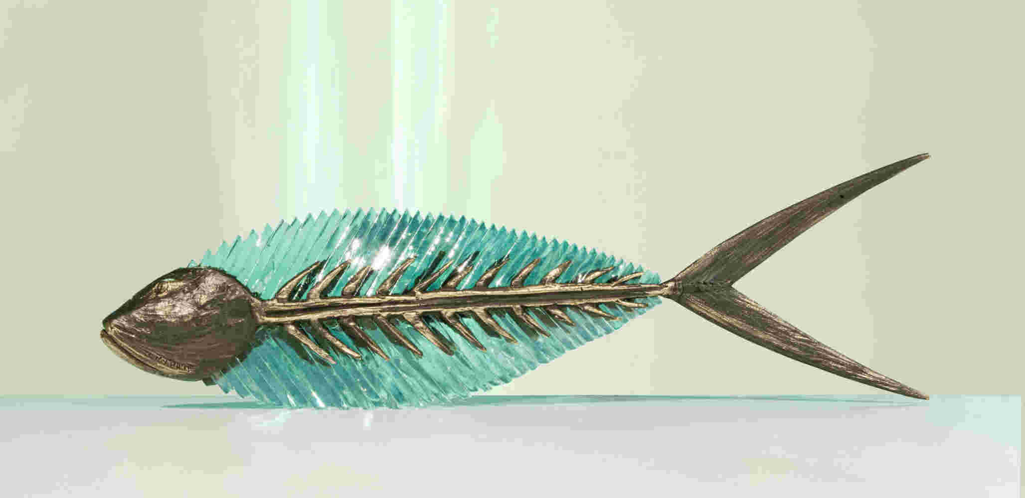 Cast bronze & glass sculpture of a fish. “Frozen Fish”.