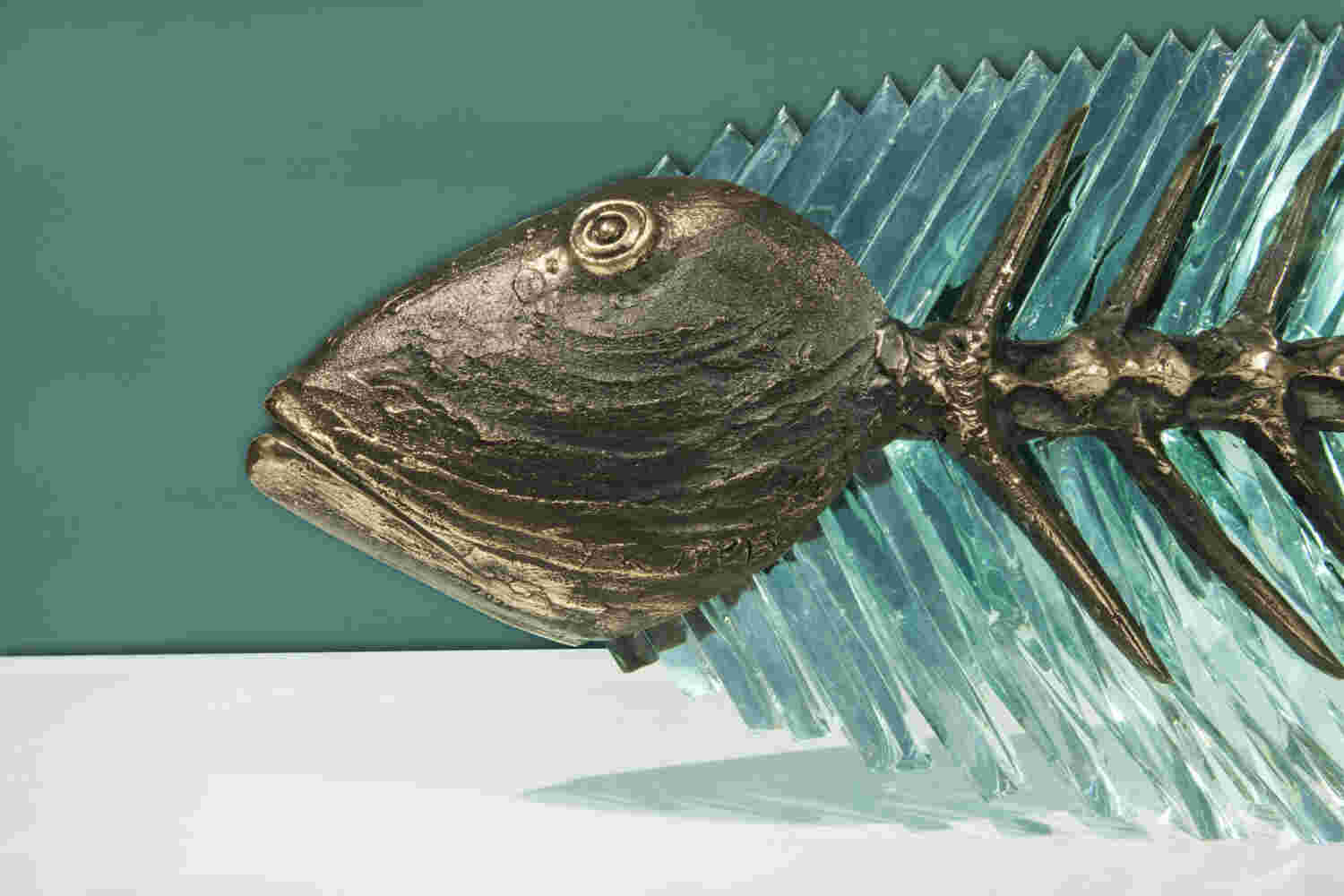 Cast bronze & glass sculpture of a fish. “Frozen Fish”.