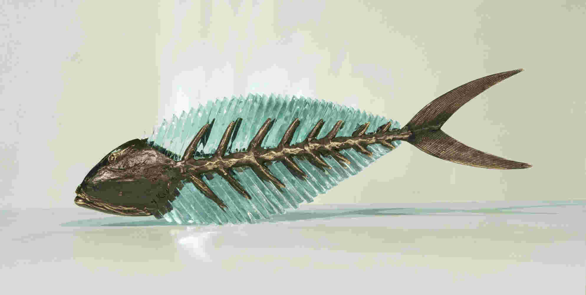 Cast bronze & glass sculpture of a fish. “Frozen Fish”.
