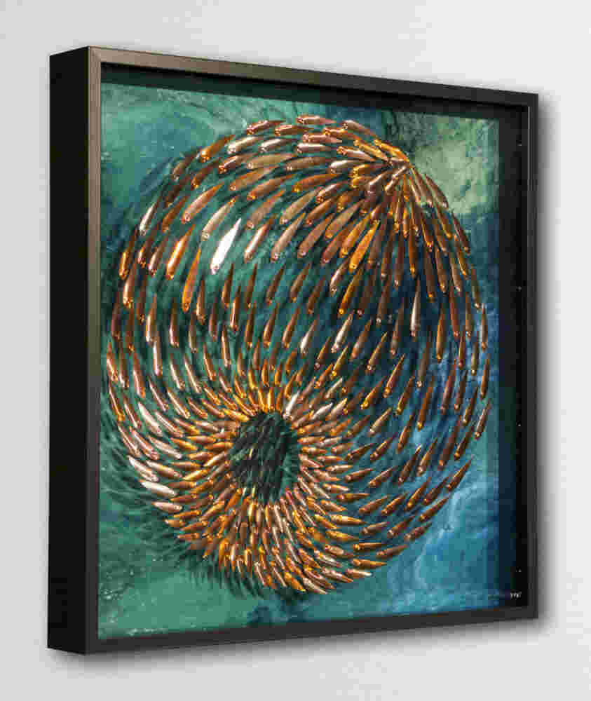 Three-dimensional wall sculpture, school of fish theme, with layers of plexiglass, aluminum frame and spherical aluminum fish.