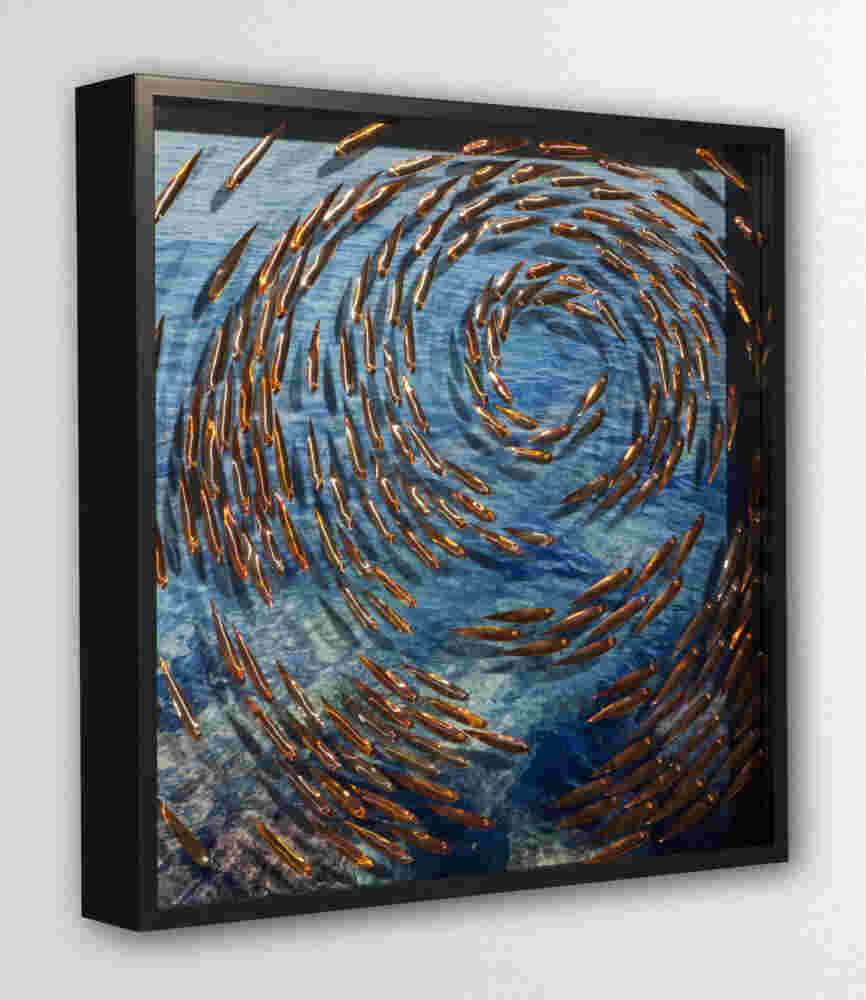 Three-dimensional wall sculpture, school of fish theme, with layers of plexiglass, aluminum frame and spherical aluminum fish.