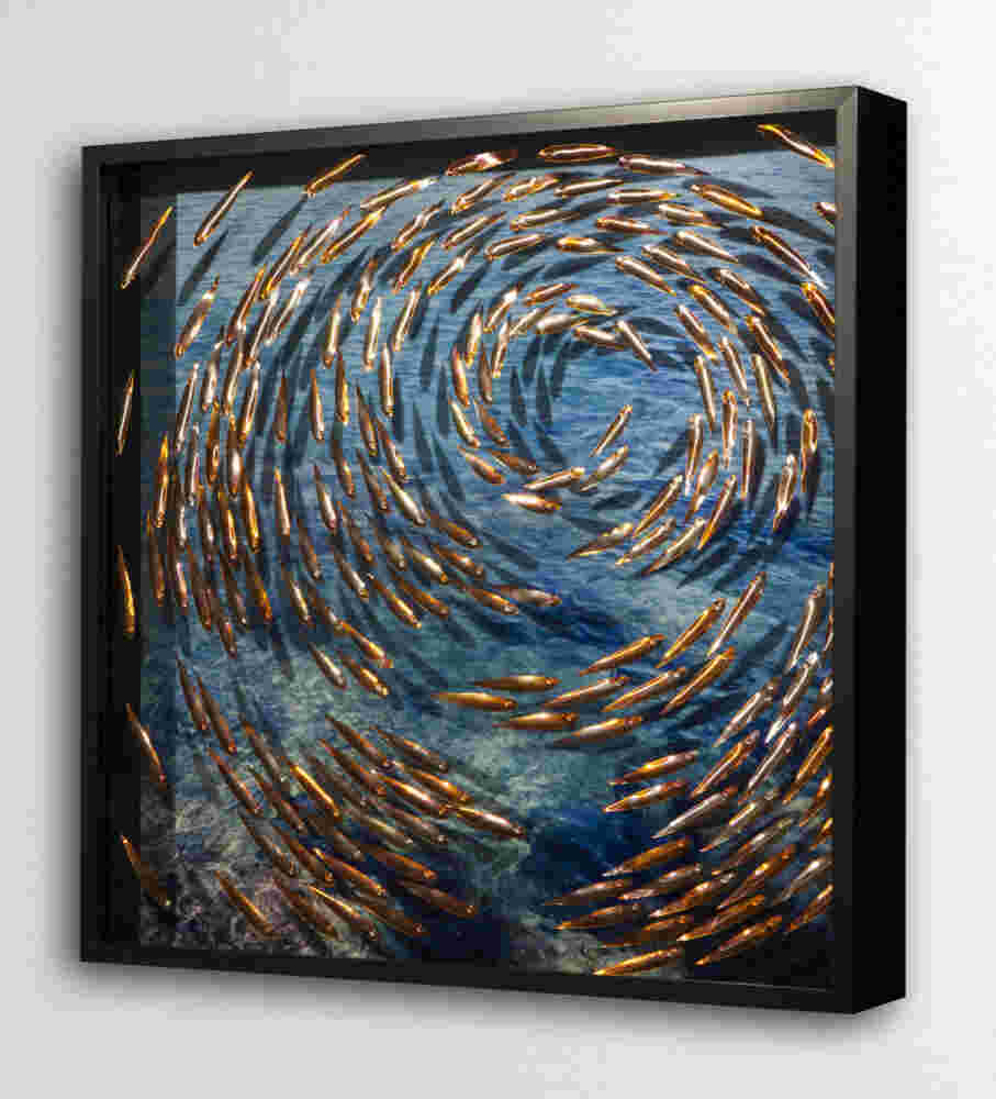 Three-dimensional wall sculpture, school of fish theme, with layers of plexiglass, aluminum frame and spherical aluminum fish.