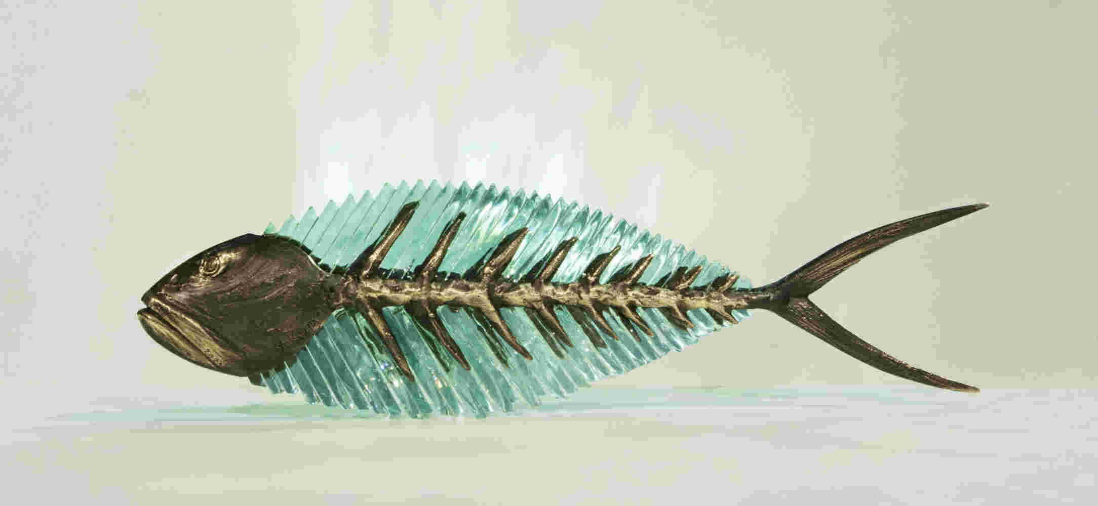 Cast bronze & glass sculpture of a fish. “Frozen Fish”.