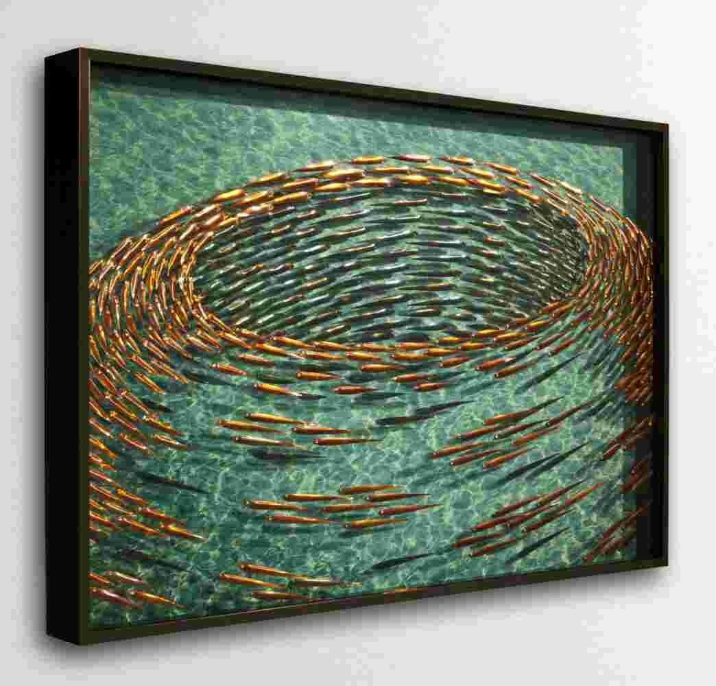 Three-dimensional wall sculpture, school of fish theme, with layers of plexiglass, aluminum frame and swirling aluminum and copper fish.